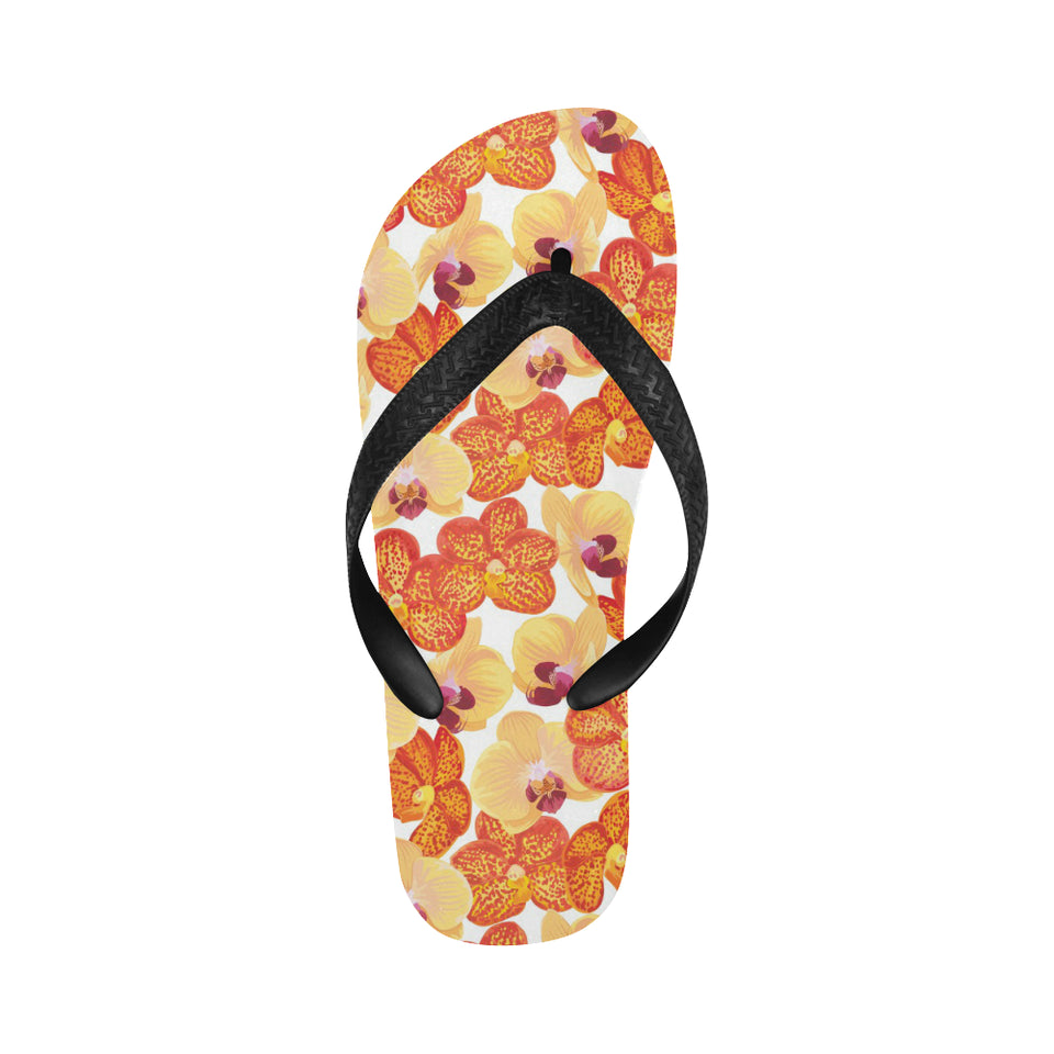 Orange yellow orchid flower pattern background Unisex Flip Flops