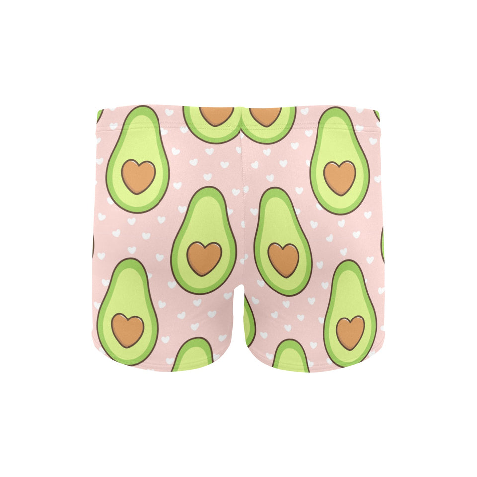 Avocado heart pink background Men's Swimming Trunks