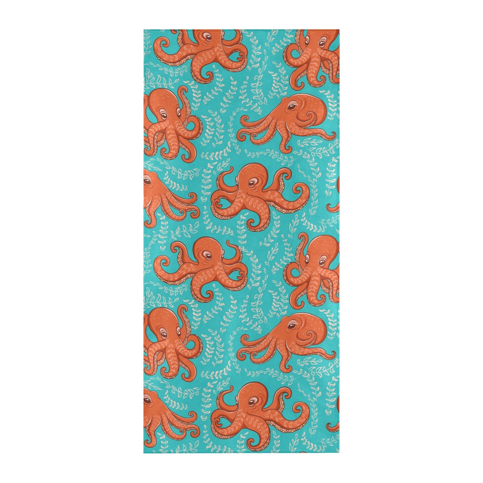 Octopus turquoise background Beach Towel