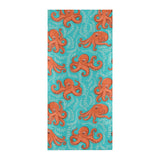 Octopus turquoise background Beach Towel