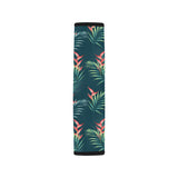 heliconia flowers, palm and monstera leaves on bla Car Seat Belt Cover