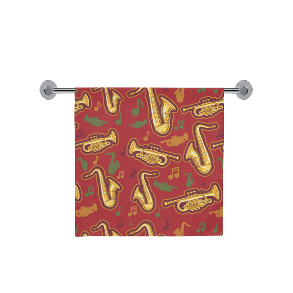 Saxophone cornet pattern red background Bath Towel