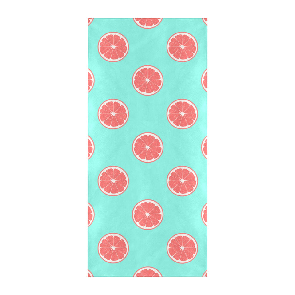 Grapefruit green background Beach Towel