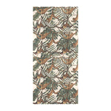 Monkey tropical leaves background Beach Towel