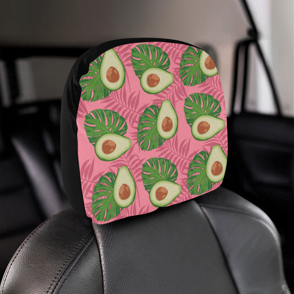 Avocado slices leaves pink back ground Car Headrest Cover