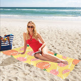 Grapefruit yellow background Beach Towel