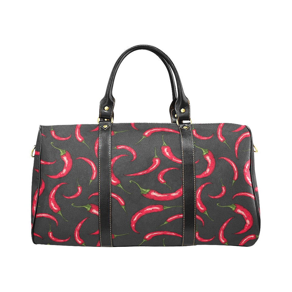 Chili peppers pattern black background Travel Bag