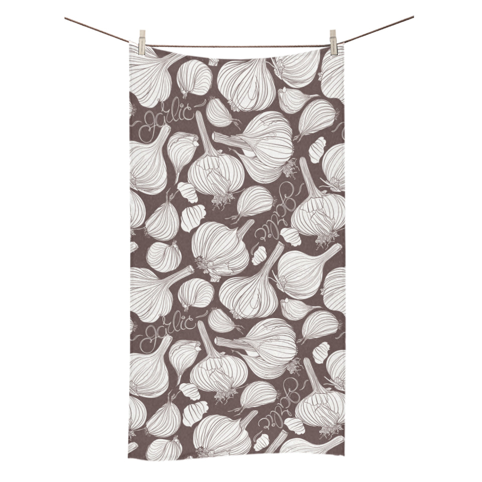 Garlic bulb dark background Bath Towel