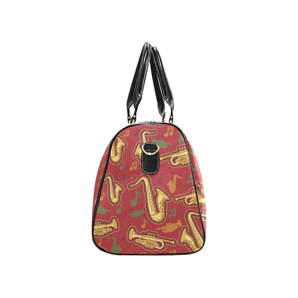 Saxophone cornet pattern red background Travel Bag