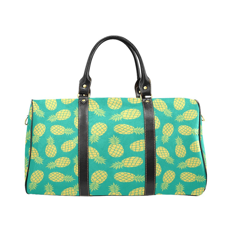 Pineapples pattern green background Travel Bag