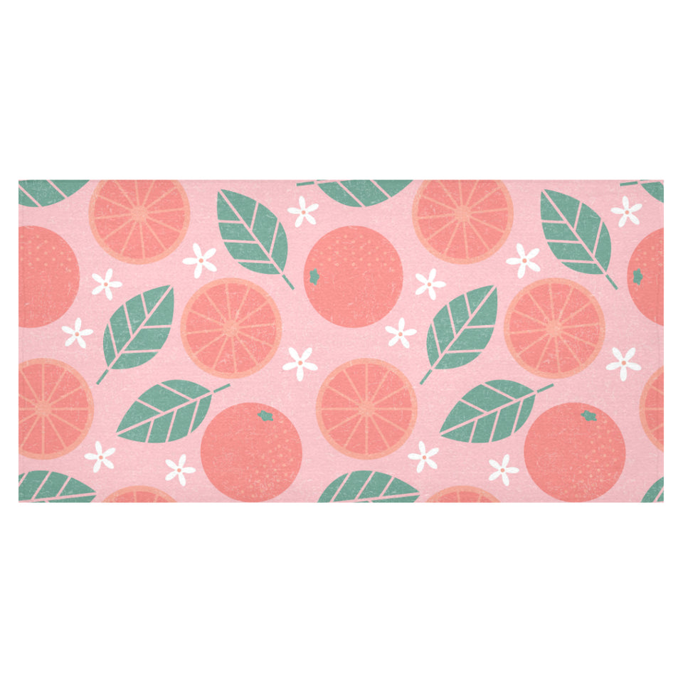 Grapefruit leaves flower pink background Tablecloth