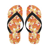Orange yellow orchid flower pattern background Unisex Flip Flops