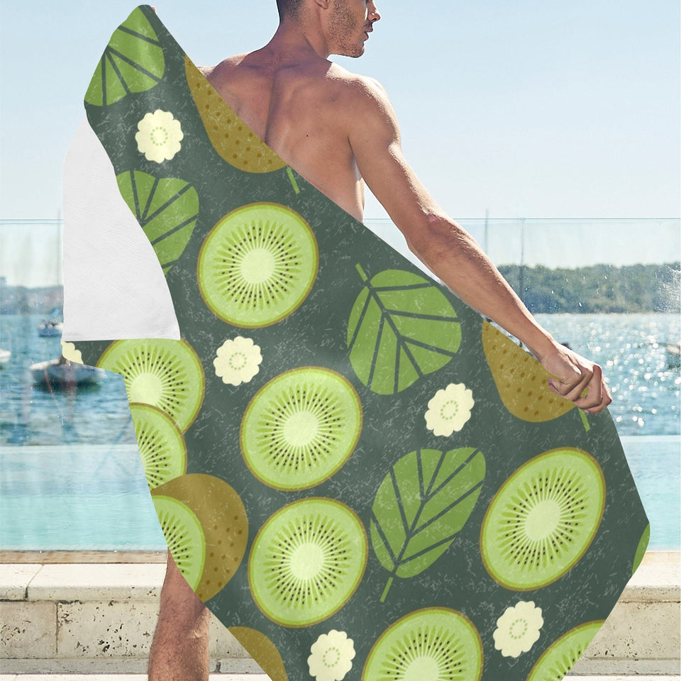Whole sliced kiwi leave and flower Beach Towel