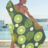 Whole sliced kiwi leave and flower Beach Towel