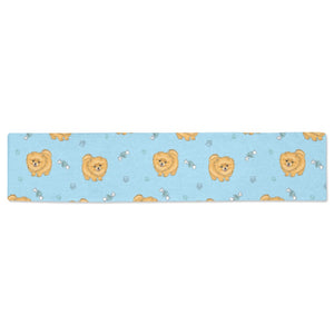 Brown cute pomeranian blue blackground Table Runner