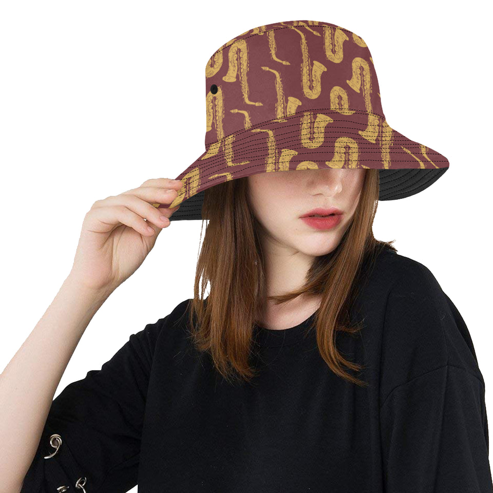 Hand drawn gold saxophone red background Unisex Bucket Hat