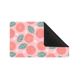Grapefruit leaves flower pink background Doormat