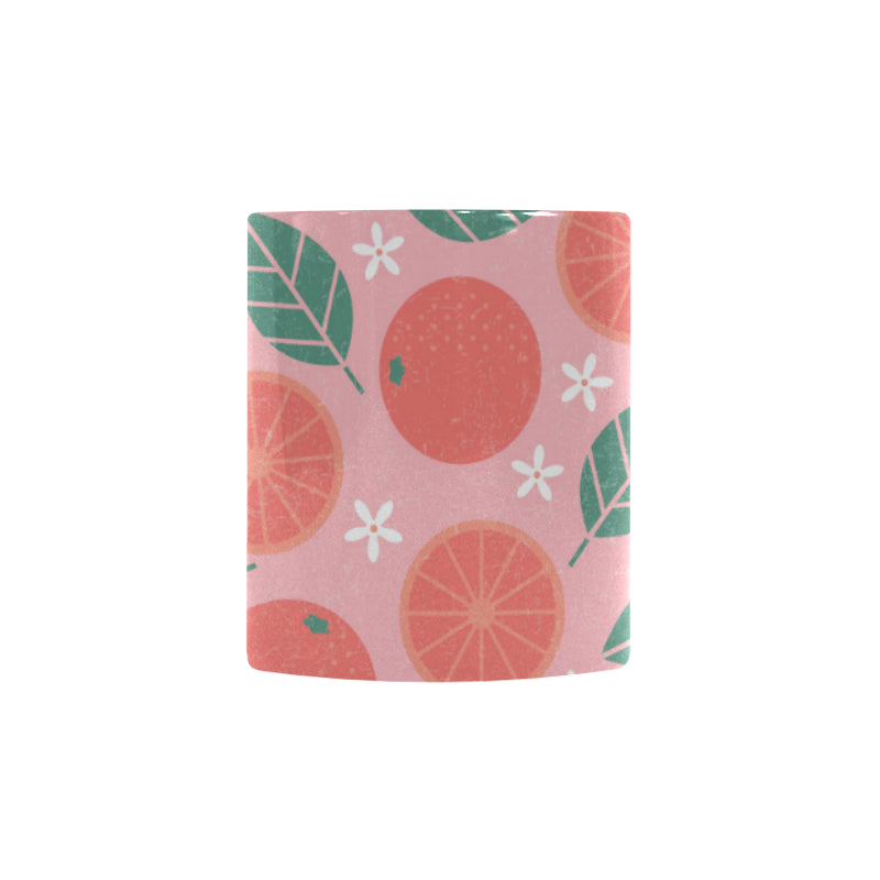 Grapefruit leaves flower pink background Morphing Mug Heat Changing Mug