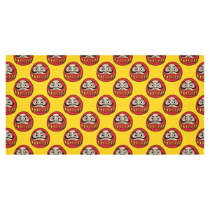 Daruma japanese wooden doll yellow background Tablecloth