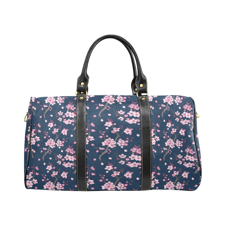 Pink sakura cherry blossom blue background Travel Bag