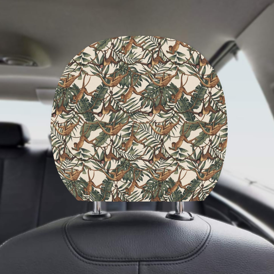 Monkey tropical leaves background Car Headrest Cover