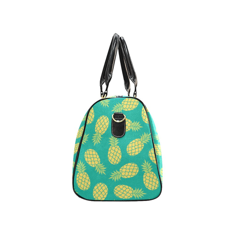 Pineapples pattern green background Travel Bag