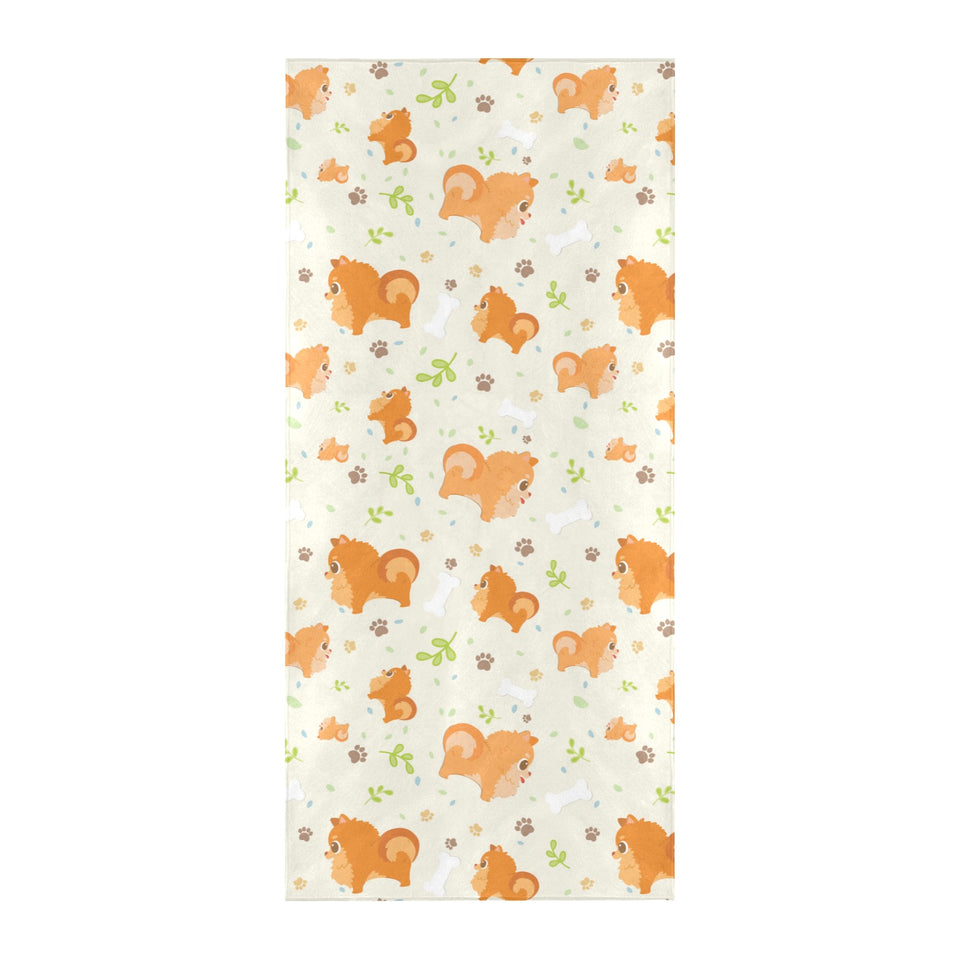 Cute brown pomeranian paw leave bone pattern Beach Towel