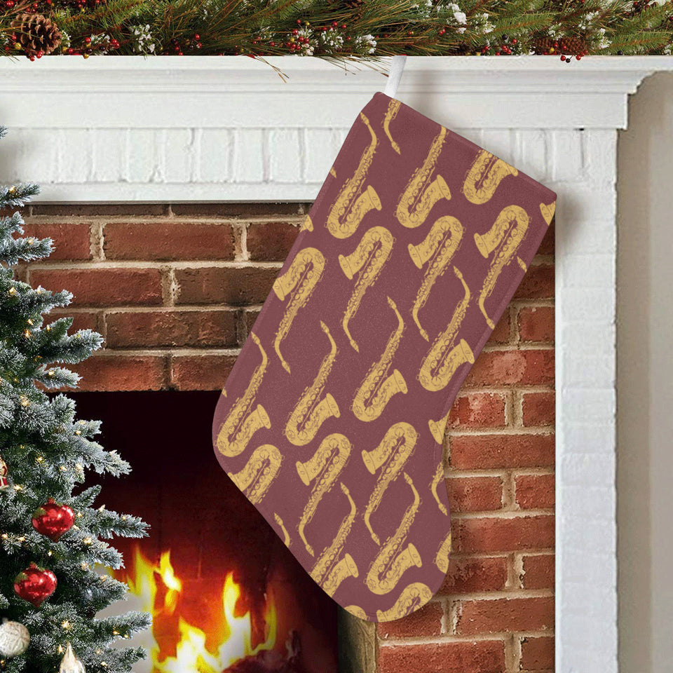 Hand drawn gold saxophone red background Christmas Stocking