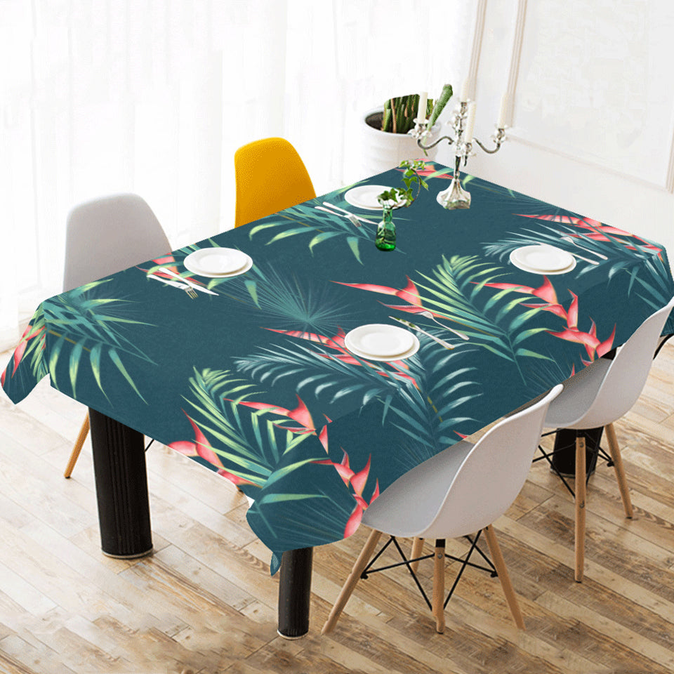 heliconia flowers, palm and monstera leaves on bla Tablecloth