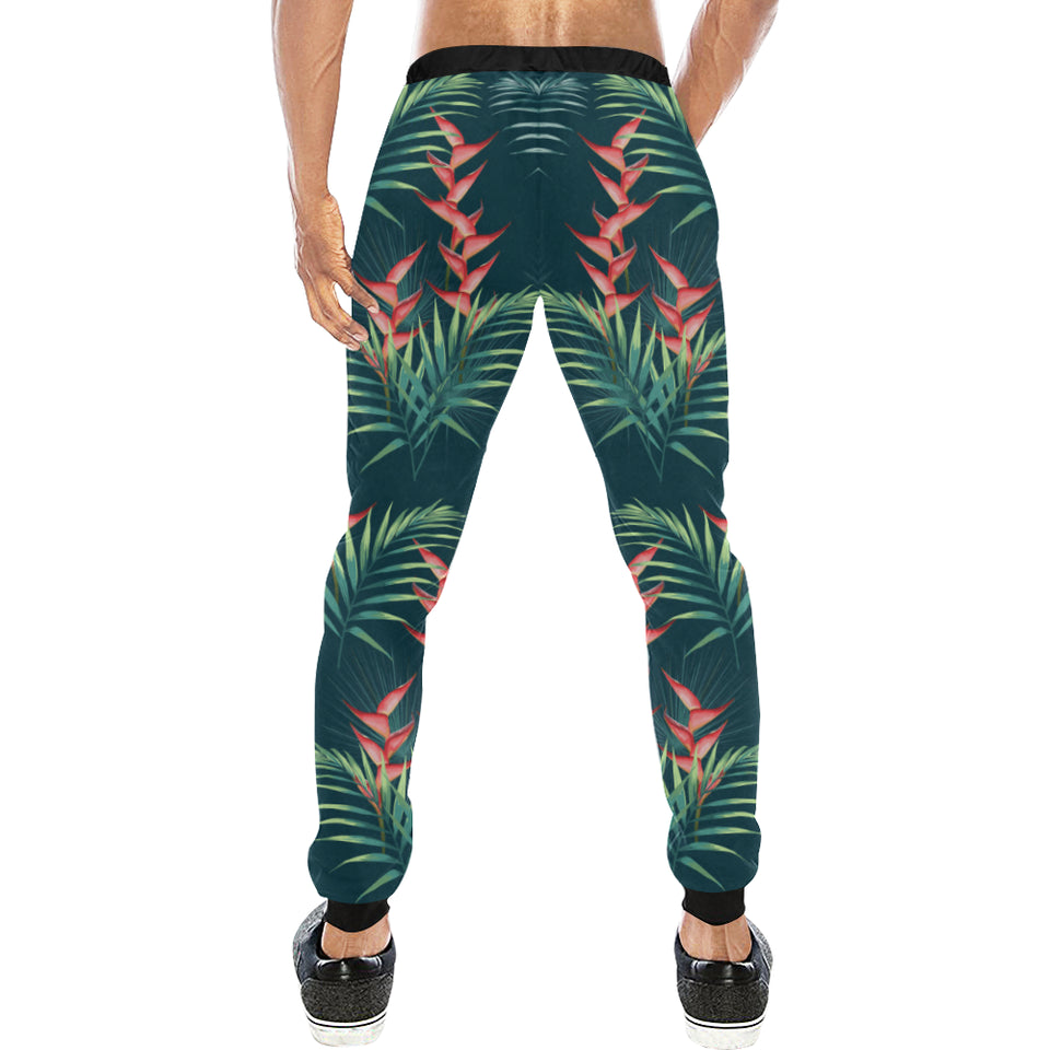 heliconia flowers, palm and monstera leaves on bla Unisex Casual Sweatpants
