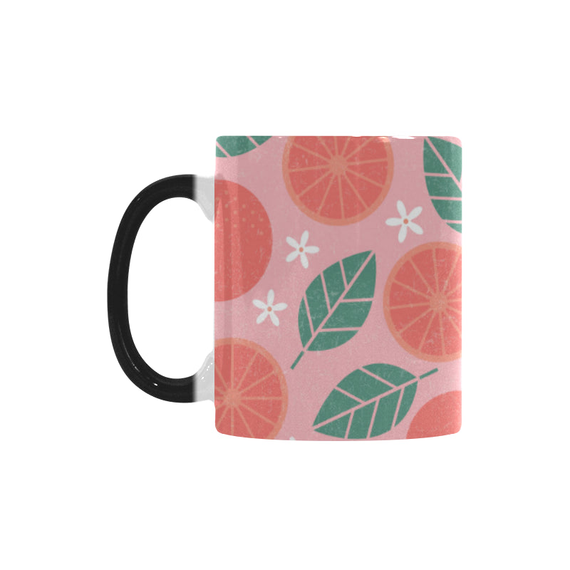 Grapefruit leaves flower pink background Morphing Mug Heat Changing Mug