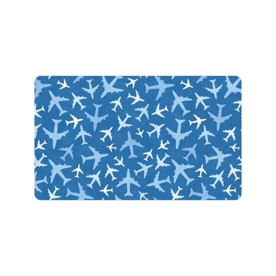 Airplane pattern in the sky Doormat