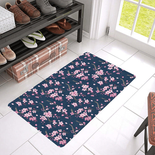 Pink sakura cherry blossom blue background Doormat