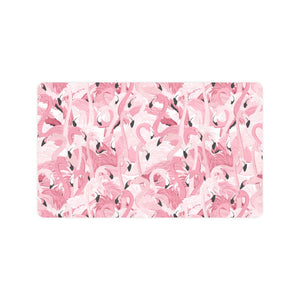 Pink flamingos pattern background Doormat