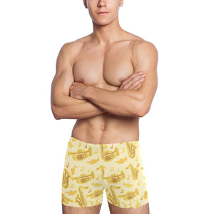 Saxophone cornet pattern yellow background Men's Swimming Trunks