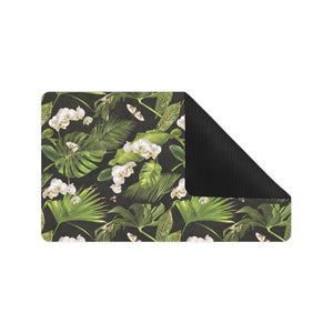 White orchid flower tropical leaves pattern blackg Doormat