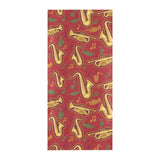 Saxophone cornet pattern red background Beach Towel