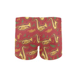 Saxophone cornet pattern red background Men's Swimming Trunks
