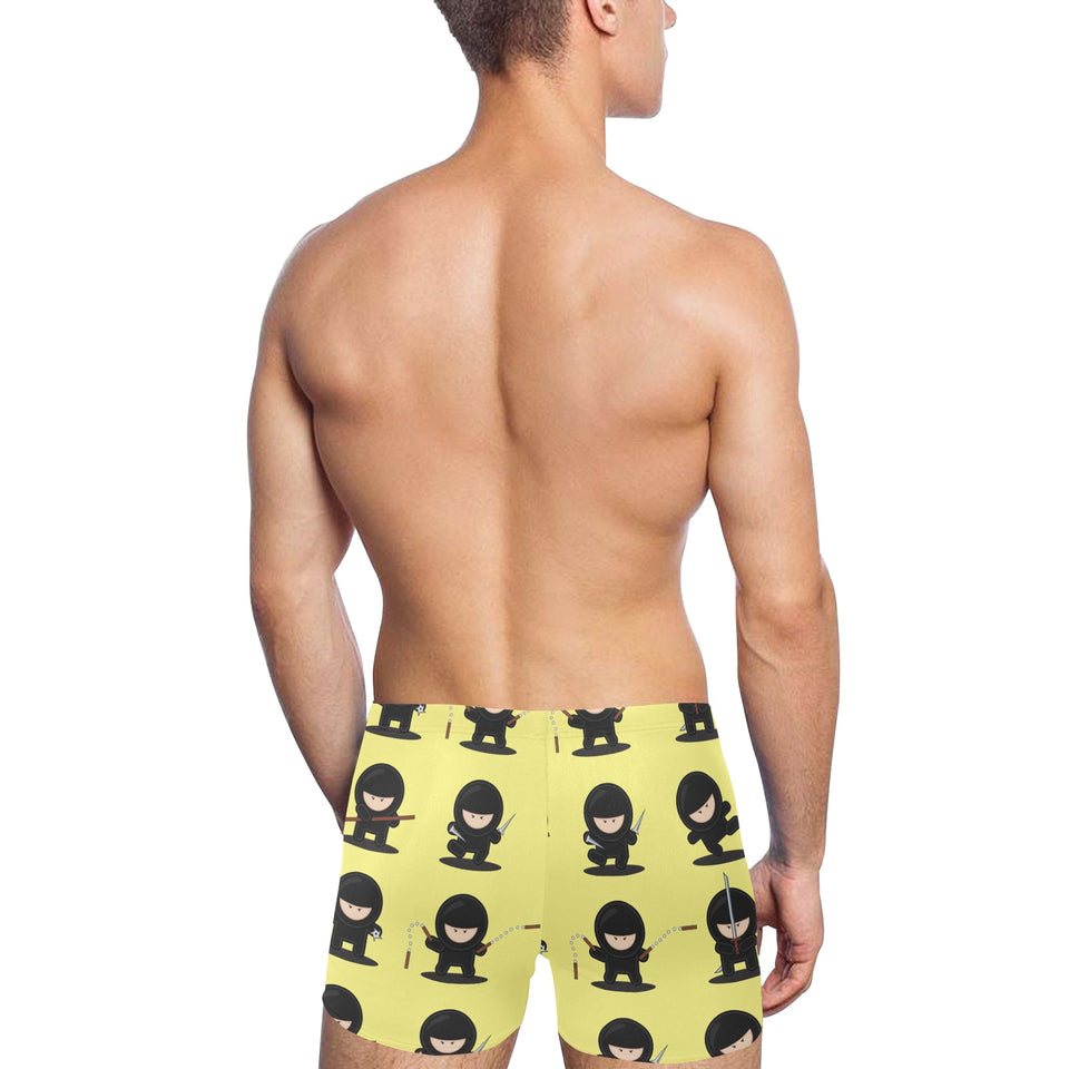 Cute ninja yellow background Men's Swimming Trunks