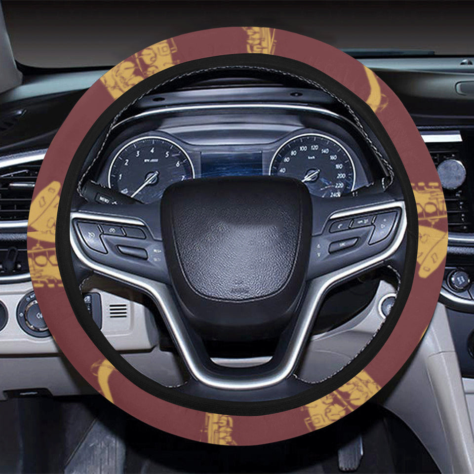 Hand drawn gold saxophone red background Car Steering Wheel Cover