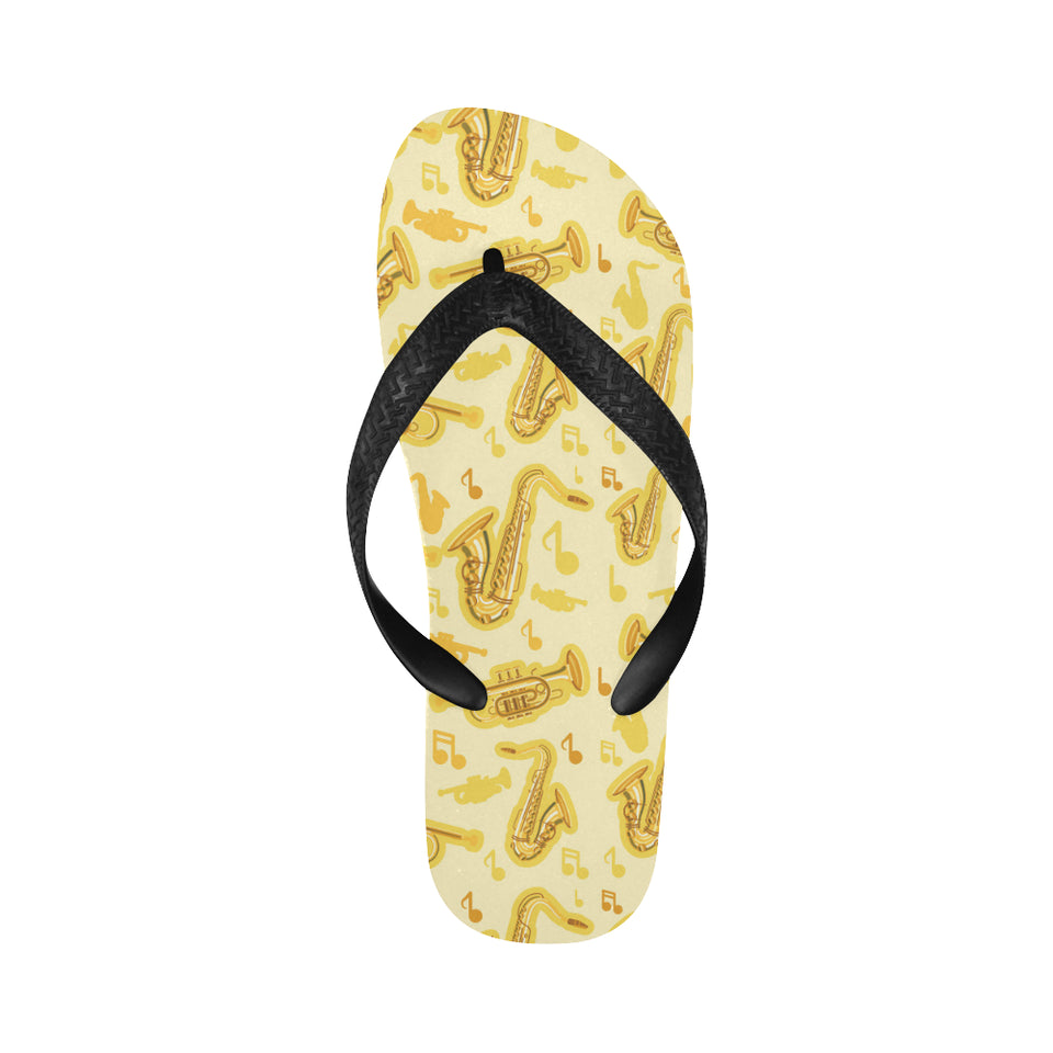 Saxophone cornet pattern yellow background Unisex Flip Flops