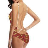 Saxophone cornet pattern red background Women's One-Piece Swimsuit