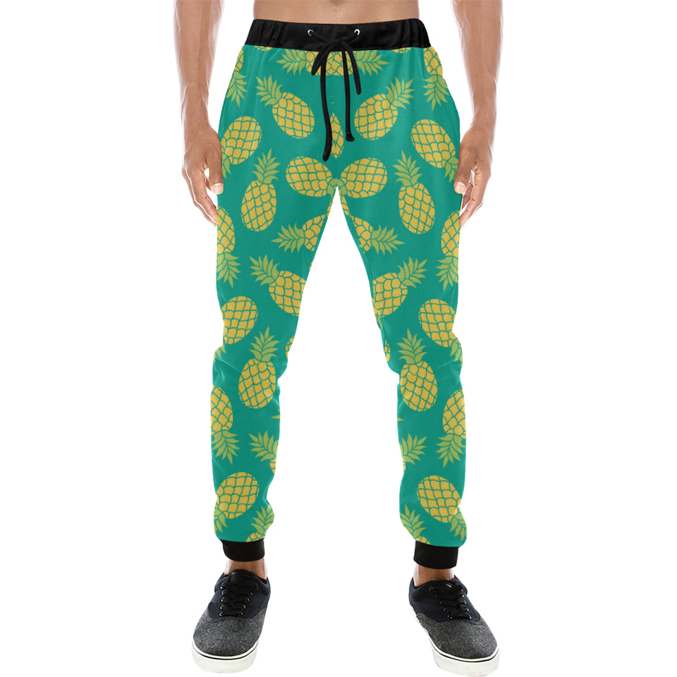 Pineapples pattern green background Unisex Casual Sweatpants
