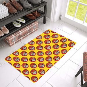 Daruma japanese wooden doll yellow background Doormat