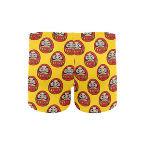 Daruma japanese wooden doll yellow background Men's Swimming Trunks