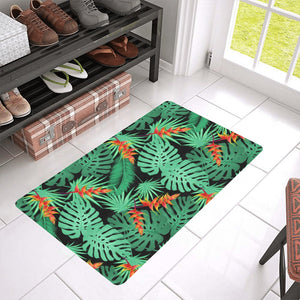 heliconia flower palm monstera leaves black backgr Doormat