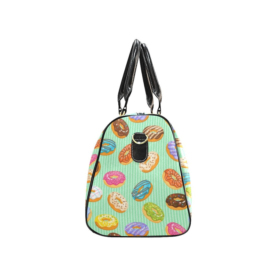 Colorful donut pattern green background Travel Bag