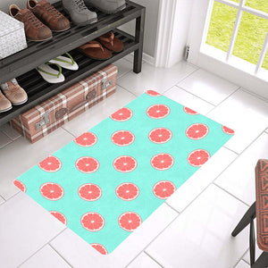 Grapefruit green background Doormat