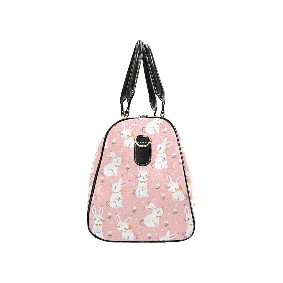 Cute white rabbit flower pink background Travel Bag