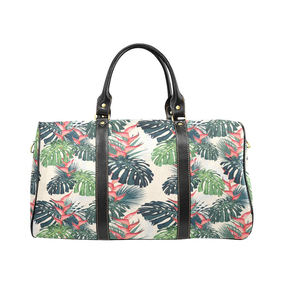 heliconia flowers, palm and monstera leaves Travel Bag